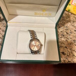 Rose gold and silver Rolex